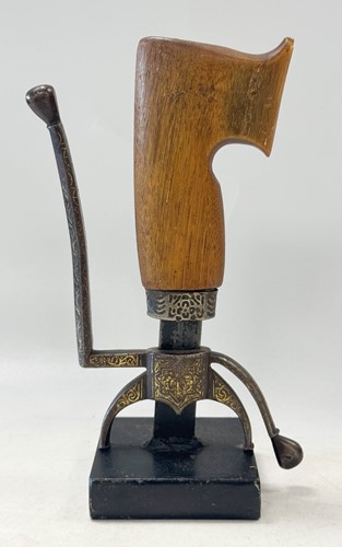 Lot 93 - A Moroccan Nimcha sword (sa'if) handle and fittings, 19th century