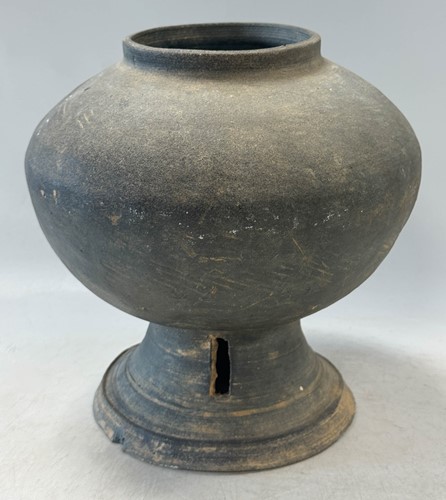 Lot 57 - A Chinese grey pottery vase, Han Dynasty