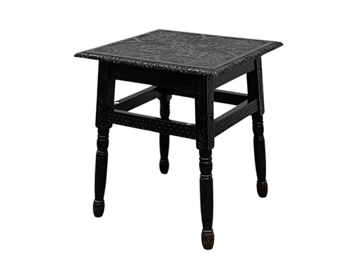 Lot 579 - A late Victorian ebonised and carved...