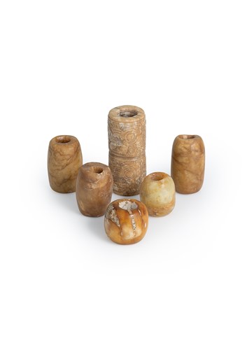 Lot 16 - A group of six jade beads, China, Liangzhu Culture, circa 3300-2300 BCE