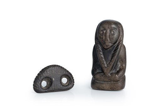 Lot 17 - A Chinese, Hongshan Culture (Neolithic period ca. 3800-2700 BCE) black stone abstract human figure