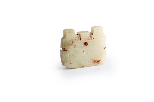 Lot 18 - A Chinese carved jade ornament, probably Shang Dynasty, circa 600-1046 BCE