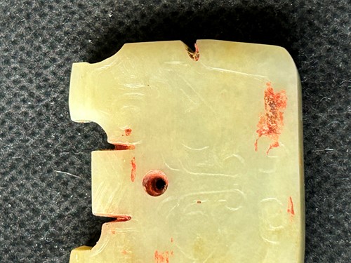 Lot 18 - A Chinese carved jade ornament, probably Shang Dynasty, circa 600-1046 BCE