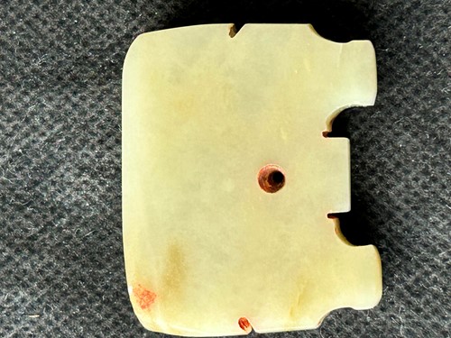 Lot 18 - A Chinese carved jade ornament, probably Shang Dynasty, circa 600-1046 BCE