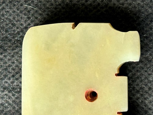 Lot 18 - A Chinese carved jade ornament, probably Shang Dynasty, circa 600-1046 BCE