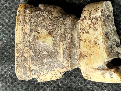 Lot 19 - A Chinese carved white jade ornament, Lingjiatan, Culture (circa 3800-3300 BCE)