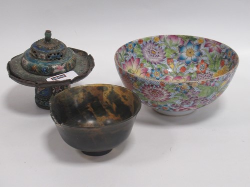 Lot 96 - A Sino-Tibetan repouse copper and enamel cup...