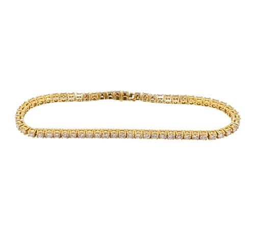 Lot 72 - An 18ct gold diamond line bracelet