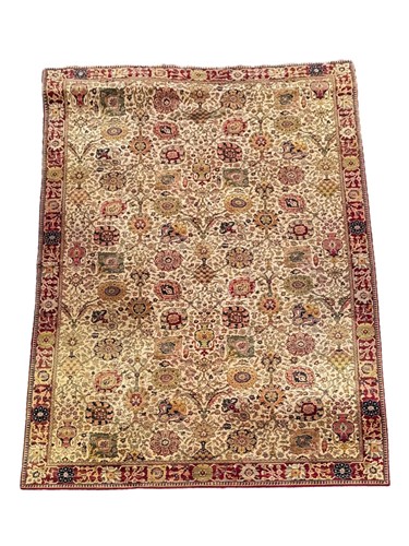 Lot 560 - A large Axminster machine-made wool carpet,...