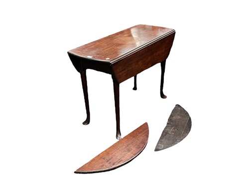 Lot 645 - A Georgian mahogany drop-leaf table, c 1750...