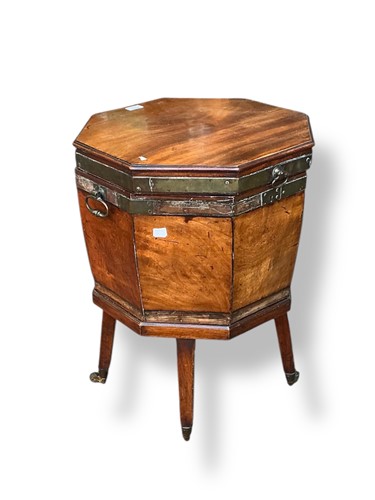 Lot 437 - A George III mahogany octagonal cellarette on...