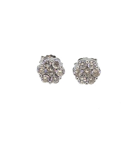 Lot 70 - A pair of diamond cluster ear studs