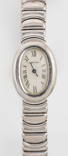 Lot 246 - Cartier - A Swiss 18ct gold 'Baignoire mini' wristwatch