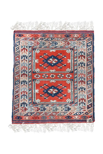 Lot 275 - A hand-knotted Turkish tribal rug, late 20th century