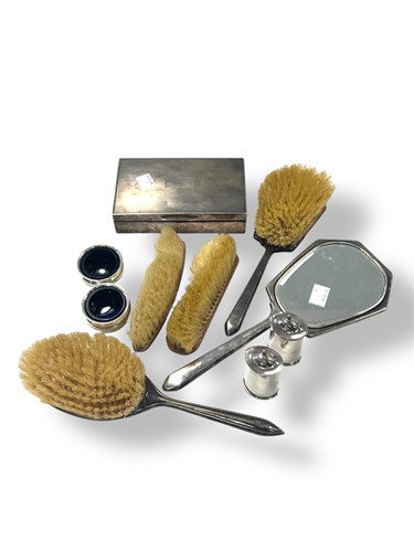Lot 269 - A three-piece silver backed dressing table set,...