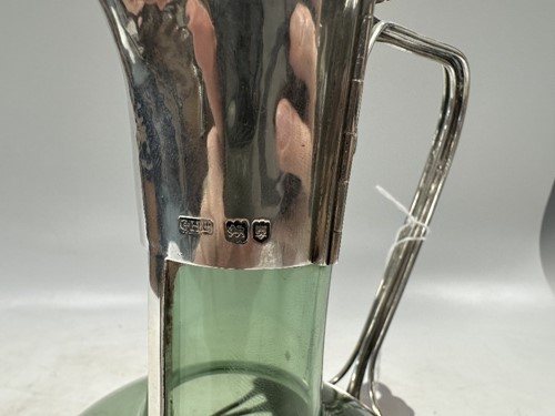 Lot 250 - Charles Robert Ashbee (1863-1942) for the Guild of Handicraft, a rare silver and glass wine decanter