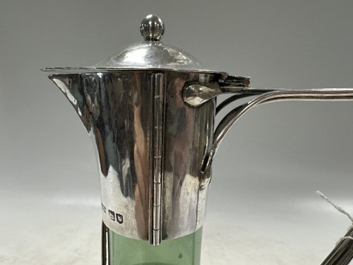 Lot 250 - Charles Robert Ashbee (1863-1942) for the Guild of Handicraft, a rare silver and glass wine decanter