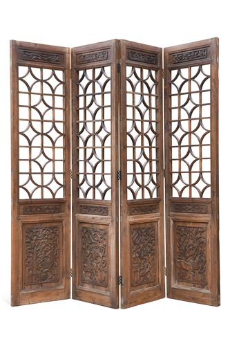 Lot 321 - A Chinese carved wood four fold screen, 20th century