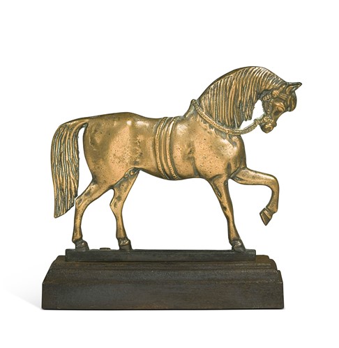 Lot 333 - A Victorian cast iron and bell-metal doorstop