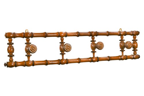 Lot 486 - A French faux-bamboo wall mounted coat rack, early 20th century