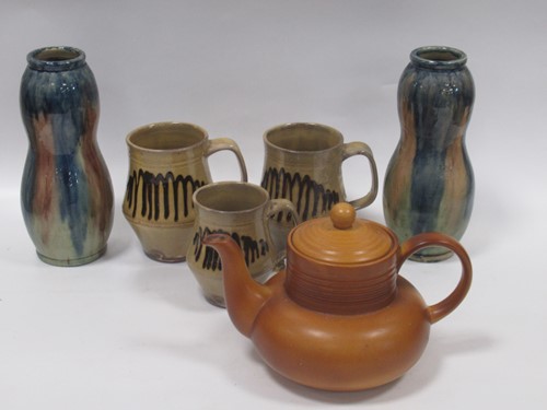 Lot 12 - Small group of studio pottery, pair slipware...