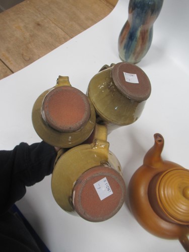 Lot 12 - A small group of studio pottery, a pair of...