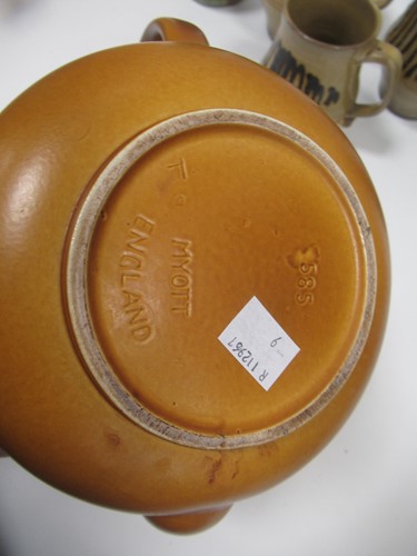 Lot 12 - A small group of studio pottery, a pair of...