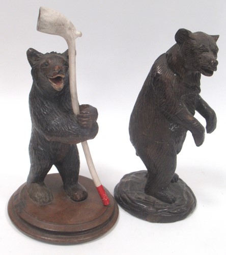 Lot 123 - An early 20th century black forest type carved...