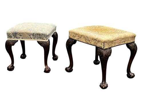 Lot 627 - Two George III style stools, on acanthus...