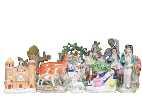 Lot 65 - A group of 19th century Staffordshire figures...