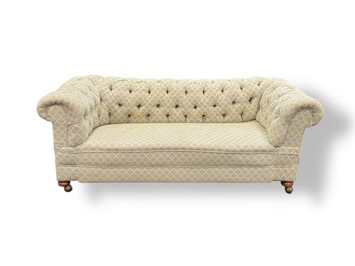 Lot 572 - An Edwardian drop end button back sofa 66 x...