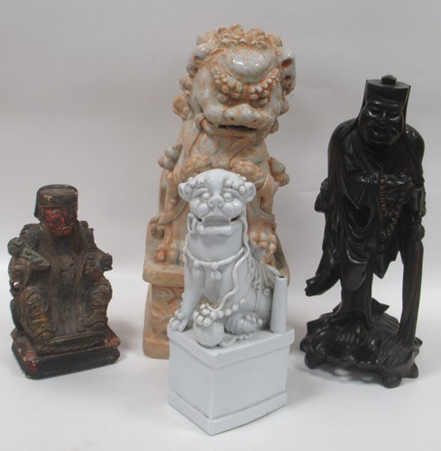 Lot 87 - A Chinese Blanc de chine Temple Dog; a carved...