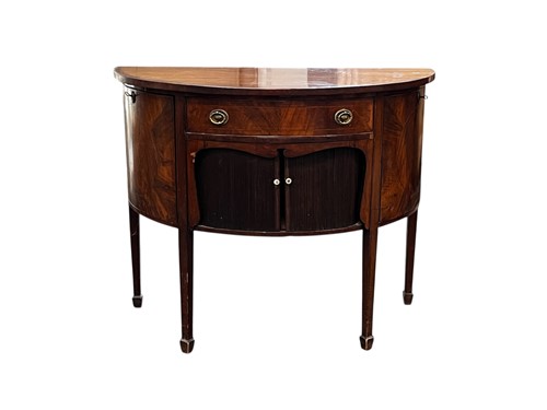 Lot 602 - A mahogany demi lune sideboard, the...