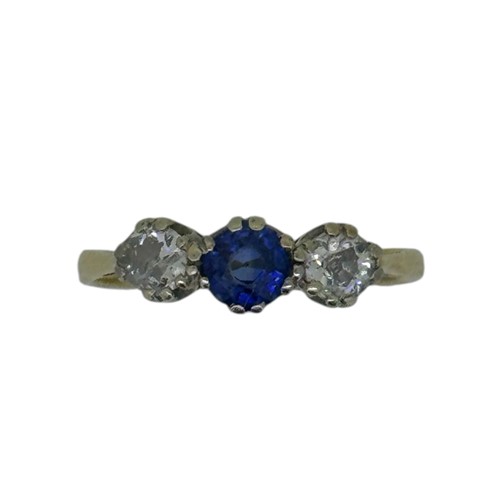 Lot 120 - An 18ct gold sapphire and diamond three stone ring