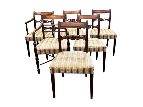 Lot 599 - A set of five Regency mahogany dining...