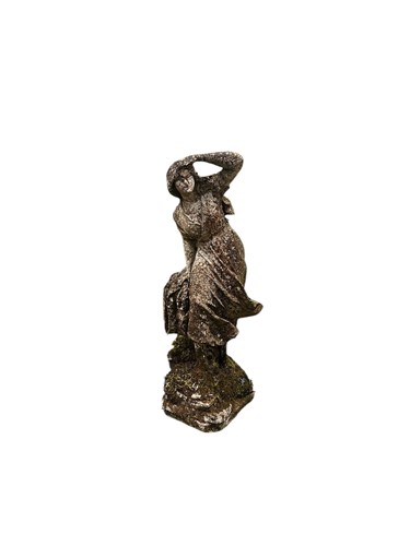 Lot 686 - Composite stone figure of a lady looking into...