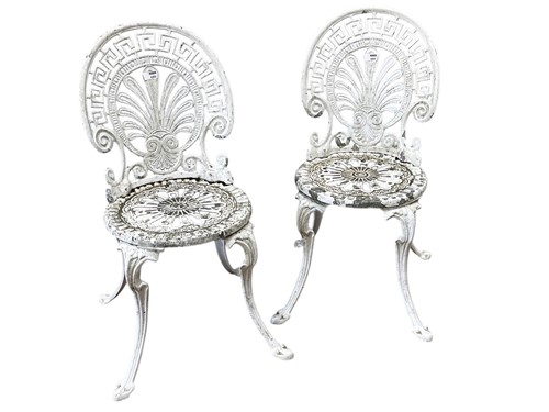 Lot 689 - A pair of white painted cast metal garden...
