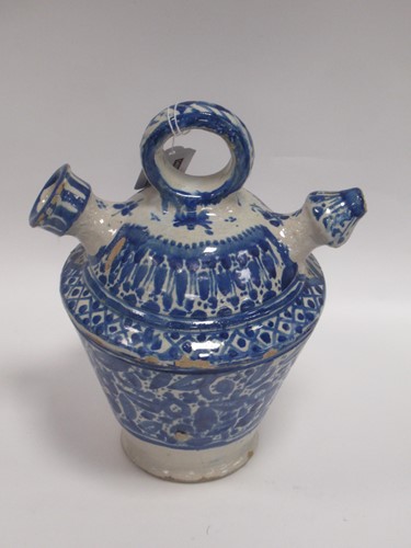 Lot 55 - A late 19th century faience water carrier with...