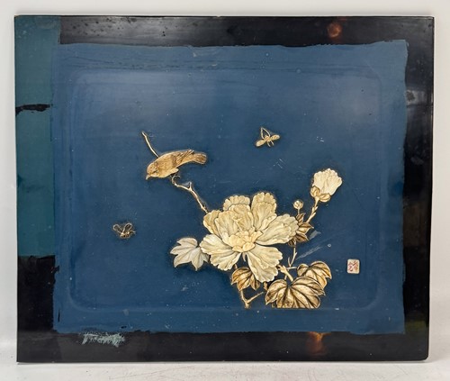 Lot 66 - A Japanese lacquered panel with flycatcher bird perched on a peony branch, Meiji period