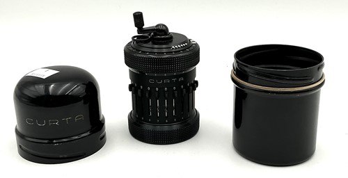 Lot 124 - A Type II Curta Calculator, marked to the base...