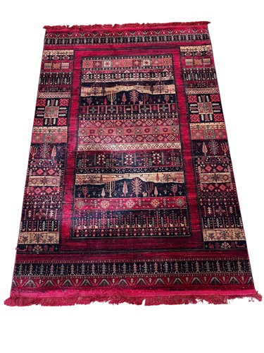 Lot 696 - A Marrakesh inspired machine woven rug,...