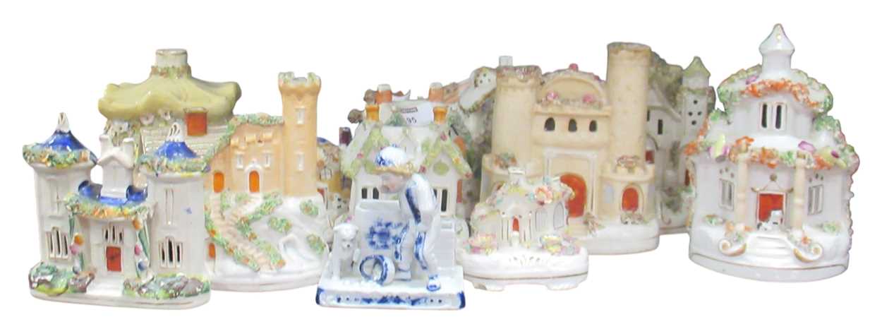 Lot 95 - A Staffordshire courting couple figural group...