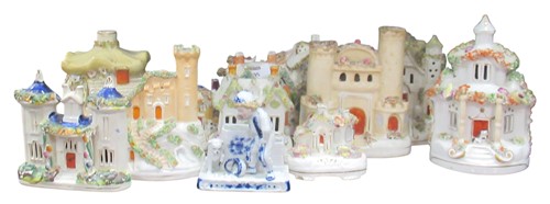 Lot 95 - A Staffordshire courting couple figural group...