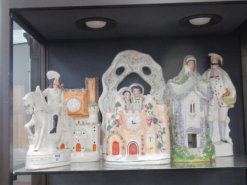 Lot 95 - A Staffordshire courting couple figural group...