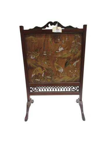 Lot 210 - An early 20th century fret cut mahogany framed...