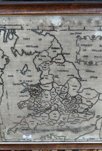Lot 247 - A framed antique map sampler on linen 'A...