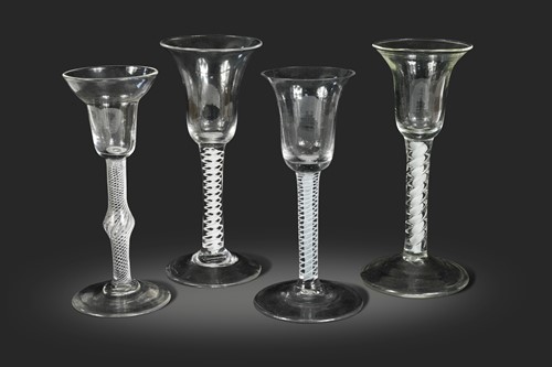 Lot 463 - Four George III air twist wine glasses