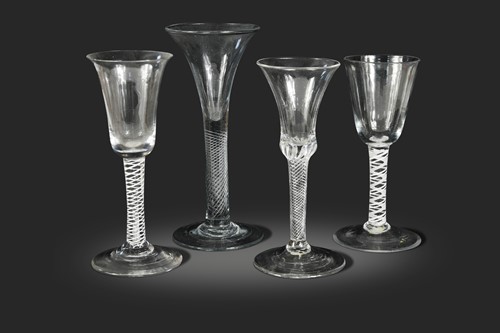 Lot 462 - Four George III air twist wine glasses