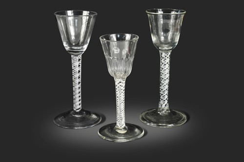 Lot 461 - Three George III air twist wine glasses