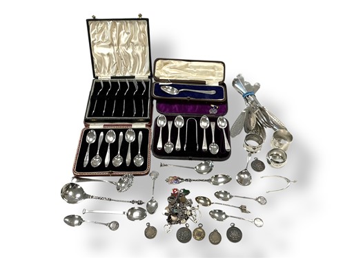 Lot 220 - A collection of silverware including cased and...